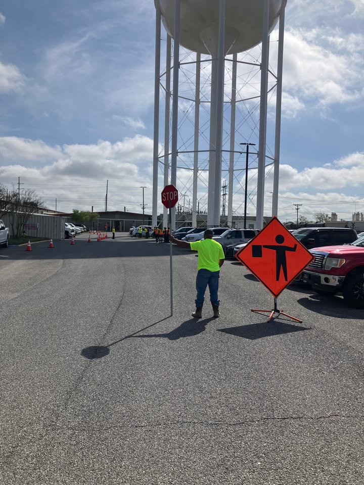 Man holding stop sign in flagging zone