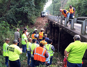 photo of workers learning local bridge inspection processes