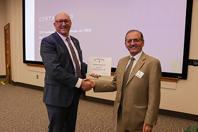 From left to right: Dr. Matt Lee (Keynote Speaker), Dr. Louay Mohammad (PKP President)